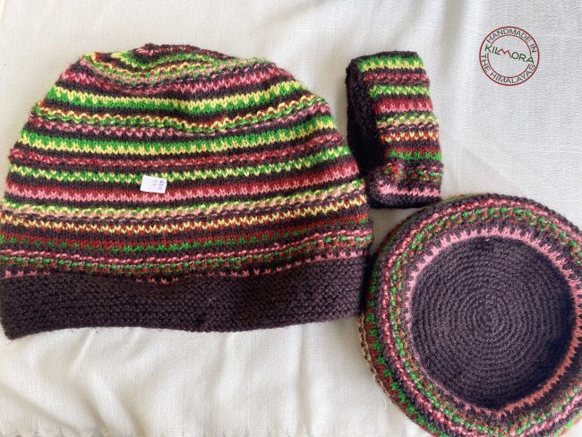 Hand knit woollen tea cosie set with a base, teapot cover and a flap to hold the handle