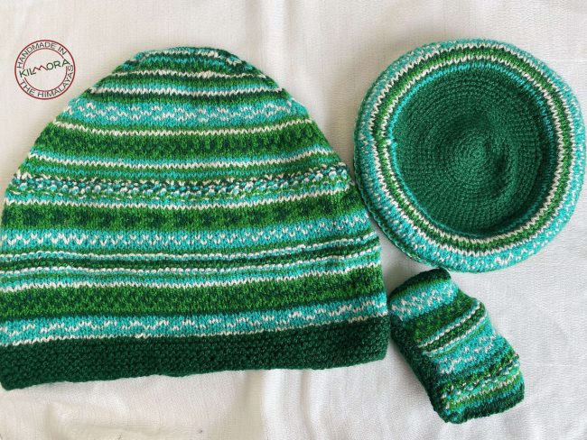 Hand knit woollen tea cosie set with a base, teapot cover and a flap to hold the handle