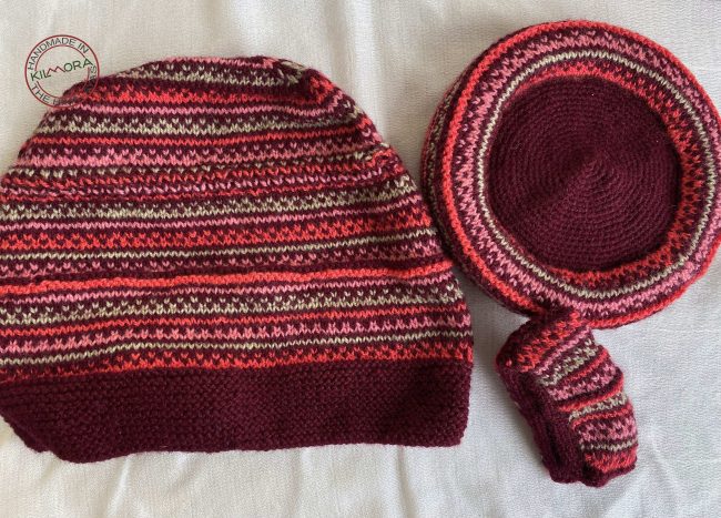 Hand knit woollen tea cosie set with a base, teapot cover and a flap to hold the handle