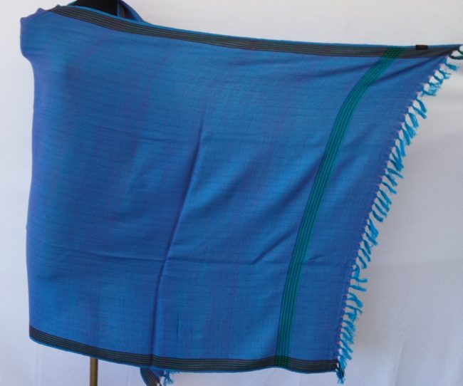 Handwoven pure merino wool shawl from Kilmora in azure blue double shaded with a hint of magenta for added richness.