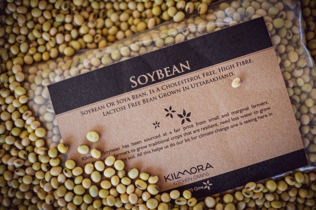 Image with a packet of Soybean labelled Soybean resting on a bed of soybean