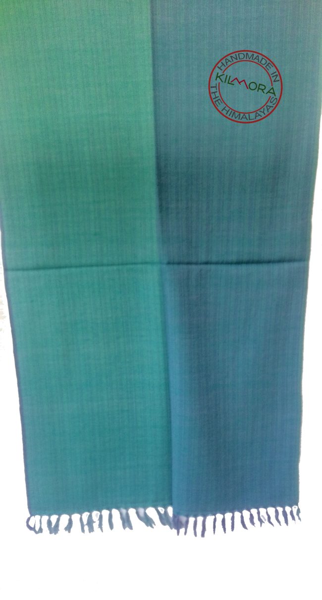 Pure merino wool reversible stole from Kilmora in horizontal stripes of teal and aquamarine.