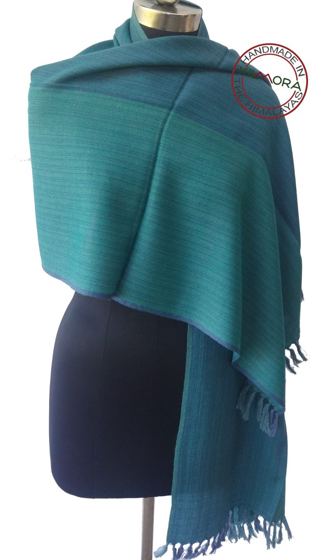 Pure merino wool reversible stole from Kilmora in horizontal stripes of teal and aquamarine.