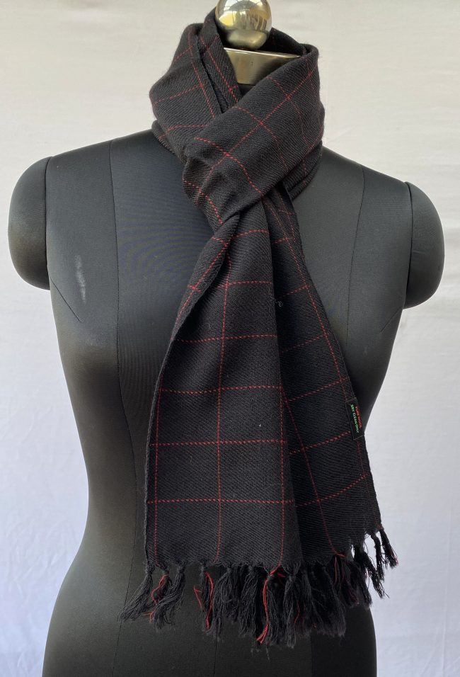 Pure merino wool scarf in black with wide rose red checked pattern