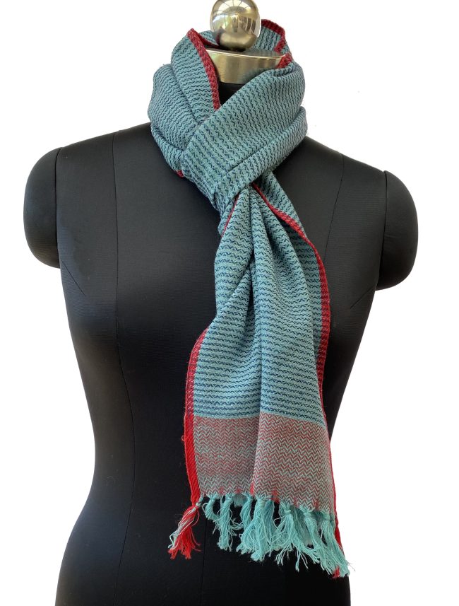 Teal blue merino wool scarf with vertical stripes, double shaded border and a cherry red edging