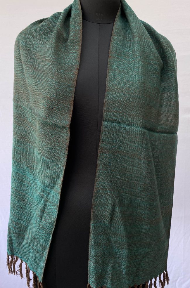 Pure merino wool scarf woven with patterns in iridescent teal with pecan brown