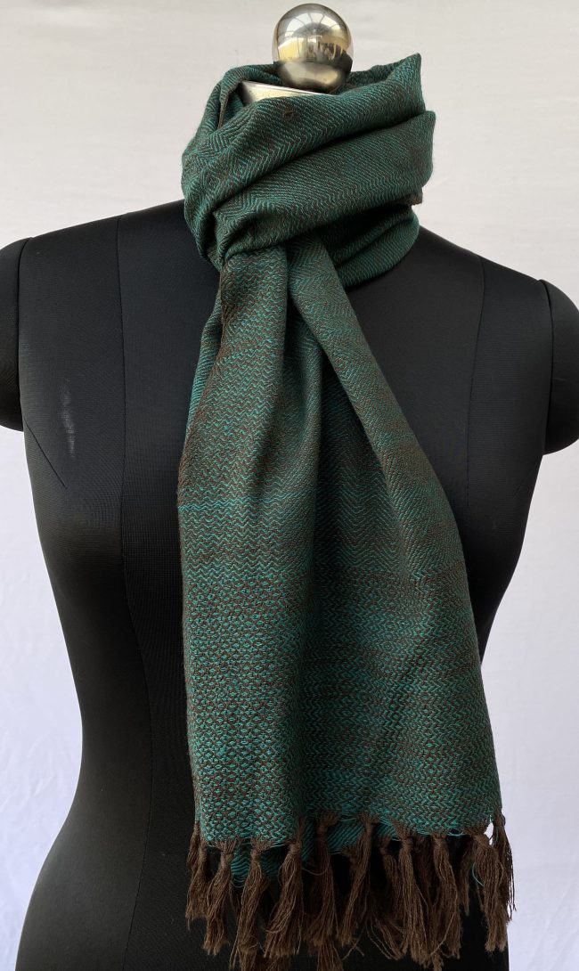 Pure metino wool scarf woven with patterns in iridescent teal with pecan brown