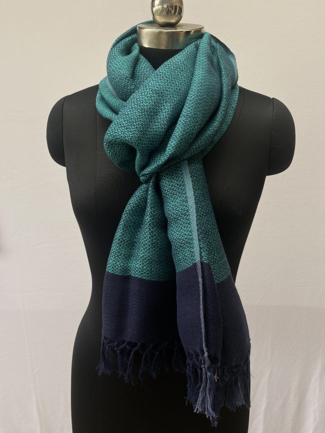 Pure cotton linen stole in shades of teal and sky blue with a navy border