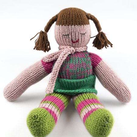 Hand-knit cotton doll with green and pink stockings, green skirt and a pink top