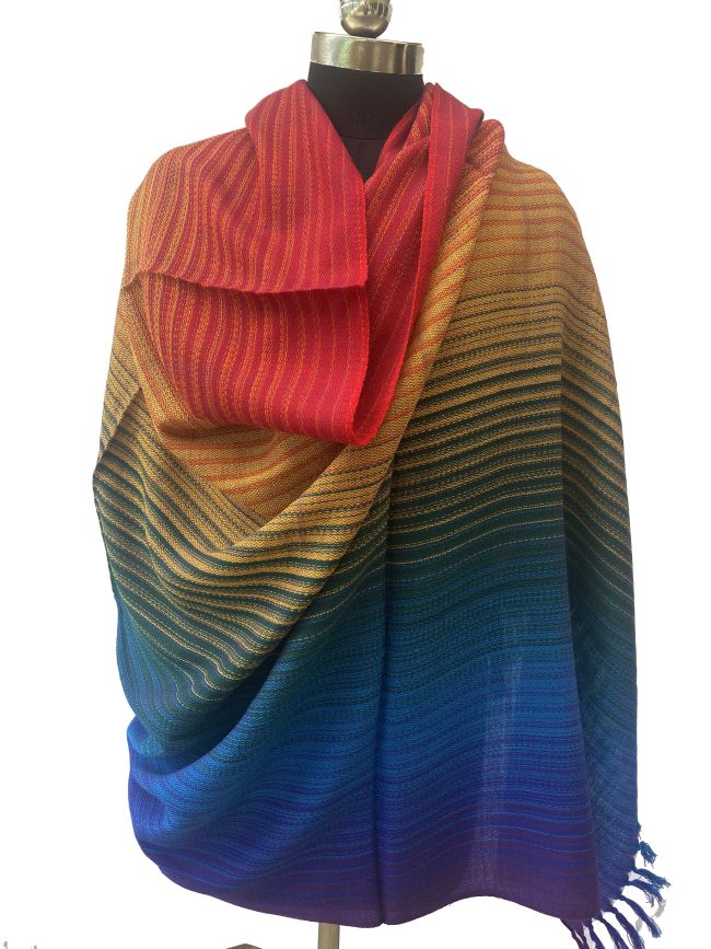 Pure merino wool handwoven shawl in gradation shades mimicking a rainbow - from indigo, blue, green, yellow, orange to red