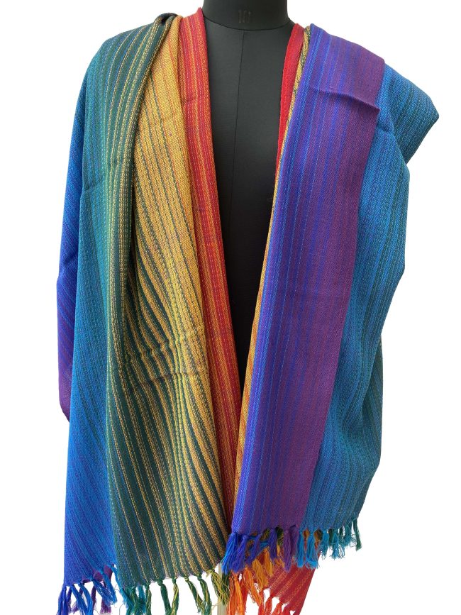 Pure merino wool handwoven shawl in gradation shades mimicking a rainbow - from indigo, blue, green, yellow, orange to red