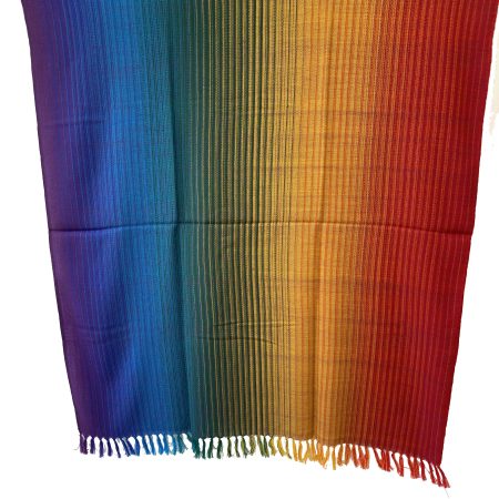 Pure merino wool handwoven shawl in gradation shades mimicking a rainbow - from indigo, blue, green, yellow, orange to red