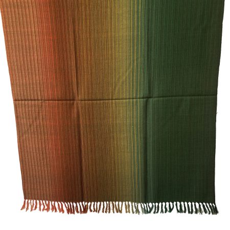 Merino wool handwoven shawl in gradation with shades ranging from brunt umber to orange to yellow and ending with pine green