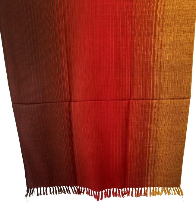 Meirno wool handwoven shawl in gradtion with shades ranging from deep maroon to crimson and tangerine