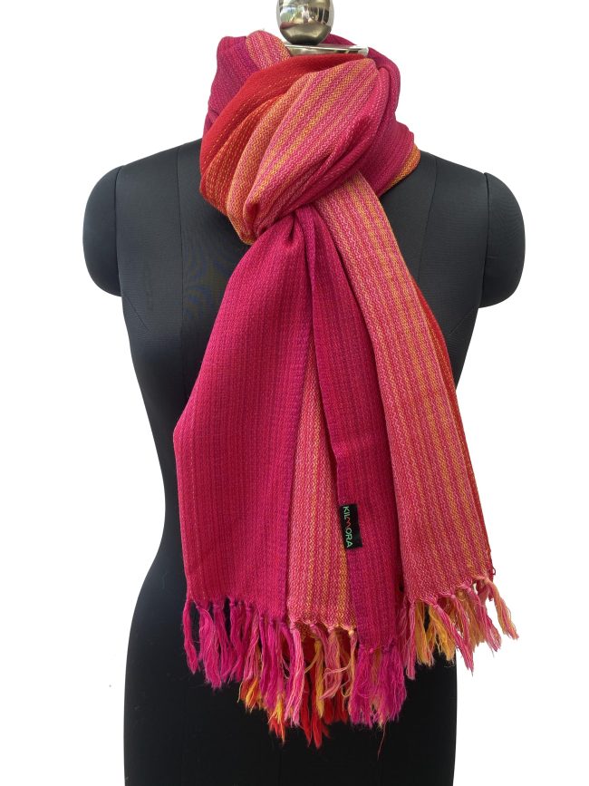 Handwoven merino wool stole in gradation in shades of scarlet, pomegranate and ruby red with a hint of citrus yellow