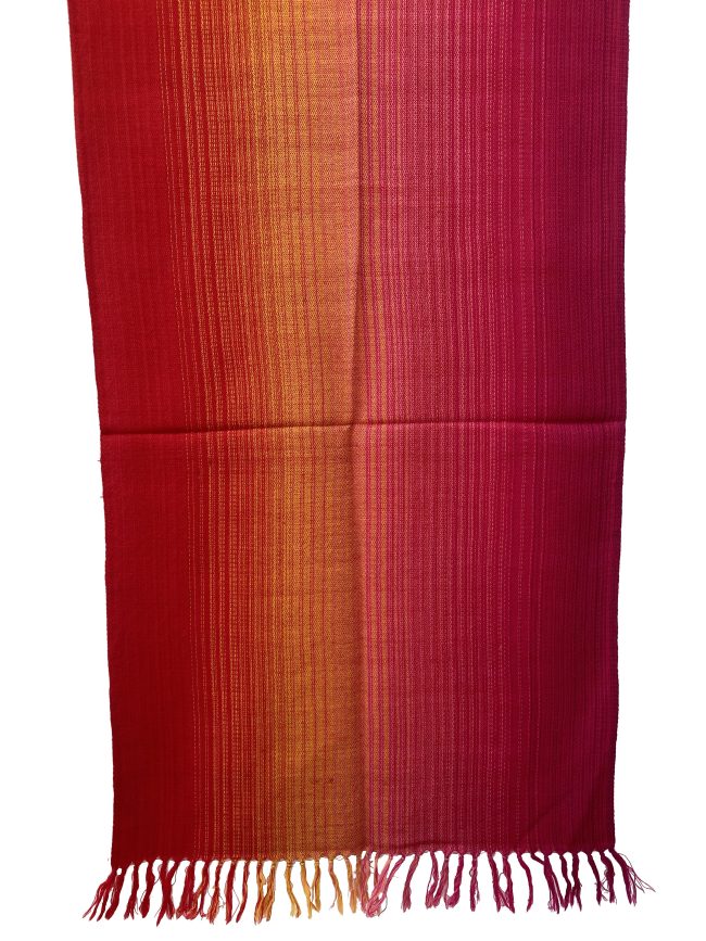 Handwoven merino wool stole in gradation in shades of scarlet, pomegranate and ruby red with a hint of citrus yellow