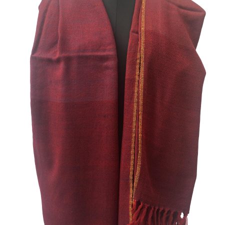 Handwoven merino wool shawl with horizontal bands of mahogany, ruby red and maroon with a thin selvedge in muted gold