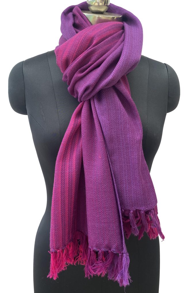 Handwoven merino wool stole in gradation weave in shades - from left right - in deep fig and magenta