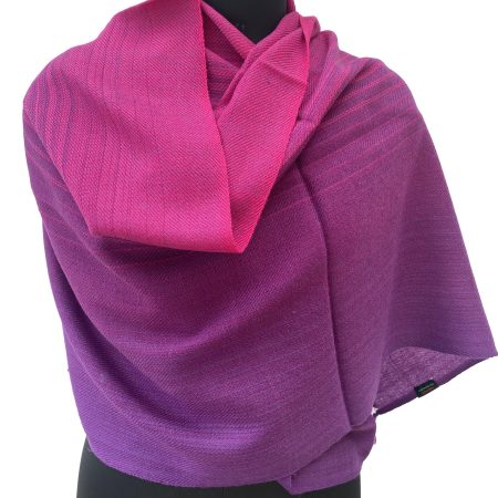 Handwoven merino wool stole in gradation weave in shades - from left right - in deep fig and magenta