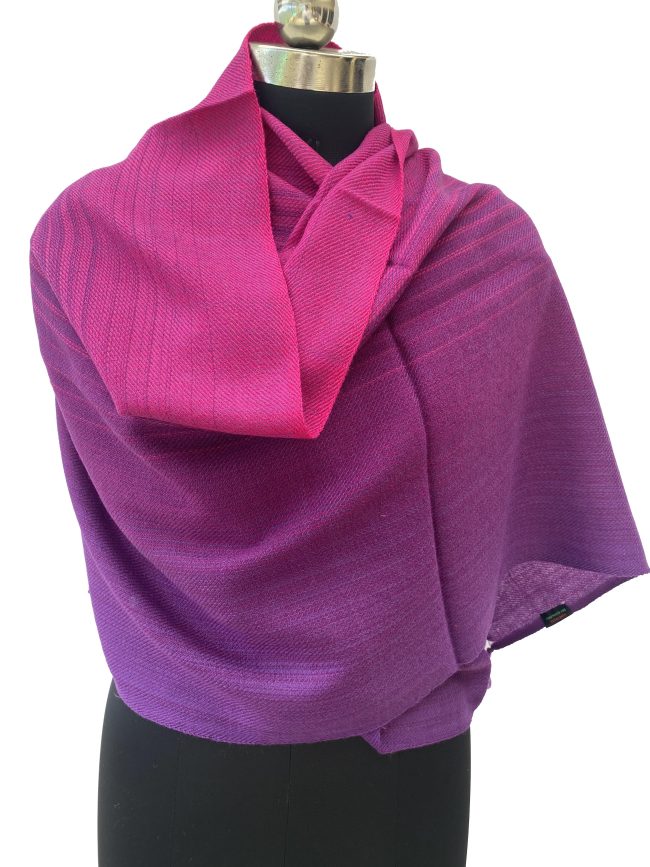 Handwoven merino wool stole in gradation weave in shades - from left right - in deep fig and magenta