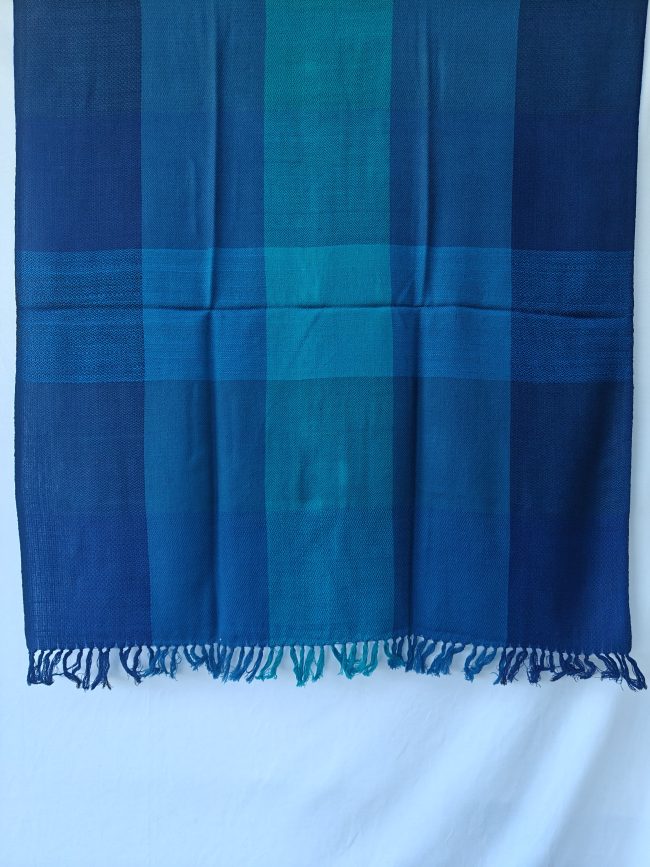 Merino wool shawl in bold blue checks in shades of aquamarine, royal blue and Egyptian blue