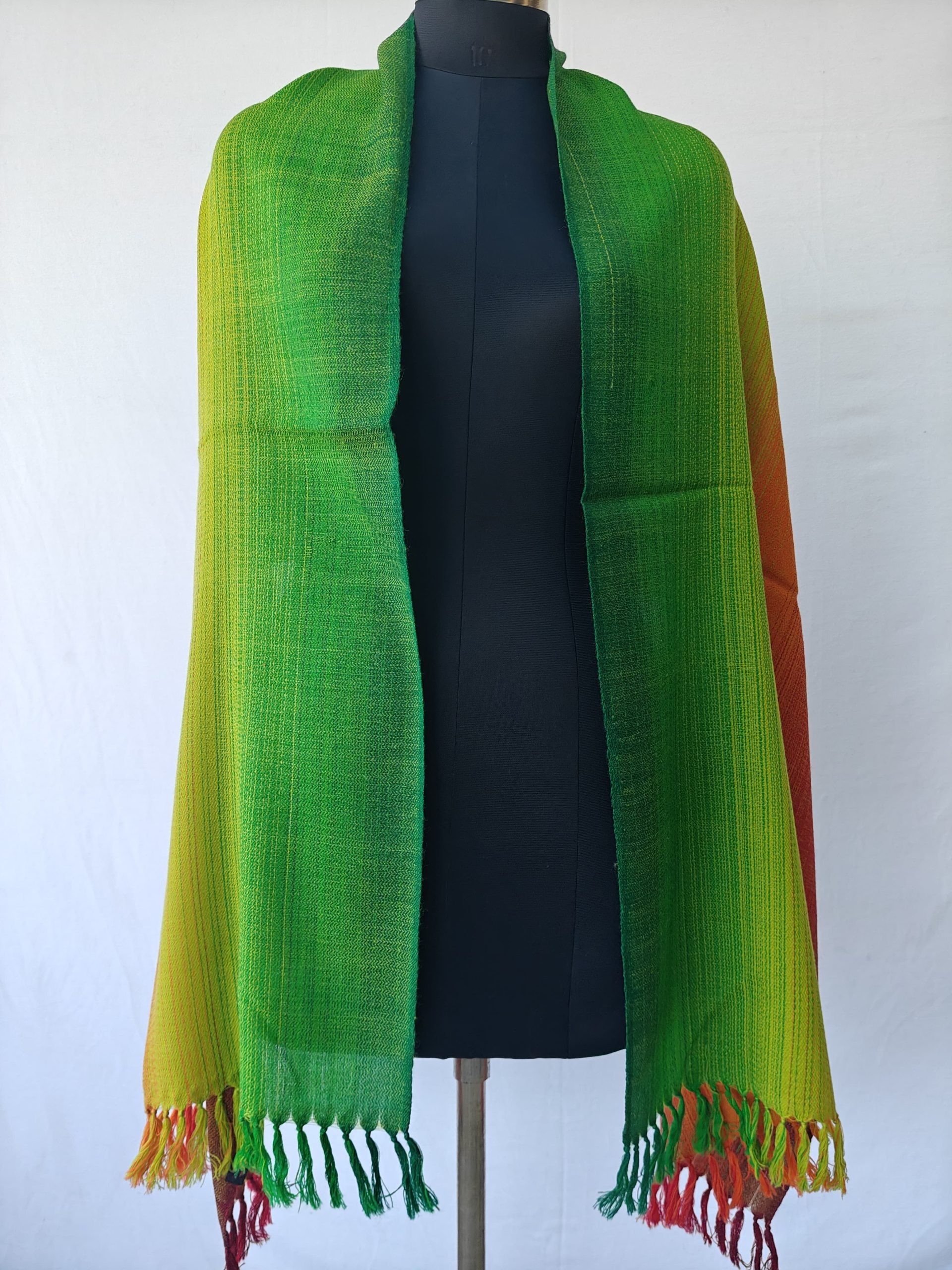 Merino wool stole in gradation weave - in shades of forest, shamrock and lime green followed by autumnal orange and mahogany