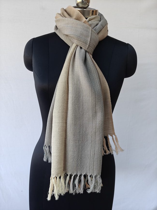 Merino wool ombre stole in shades of cream, beige, sand and royal blue